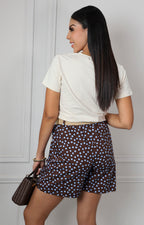 Blusa con estampado floral y aplicaciones