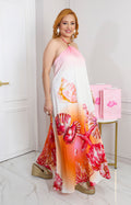 Vestido halter costero con broche dorado