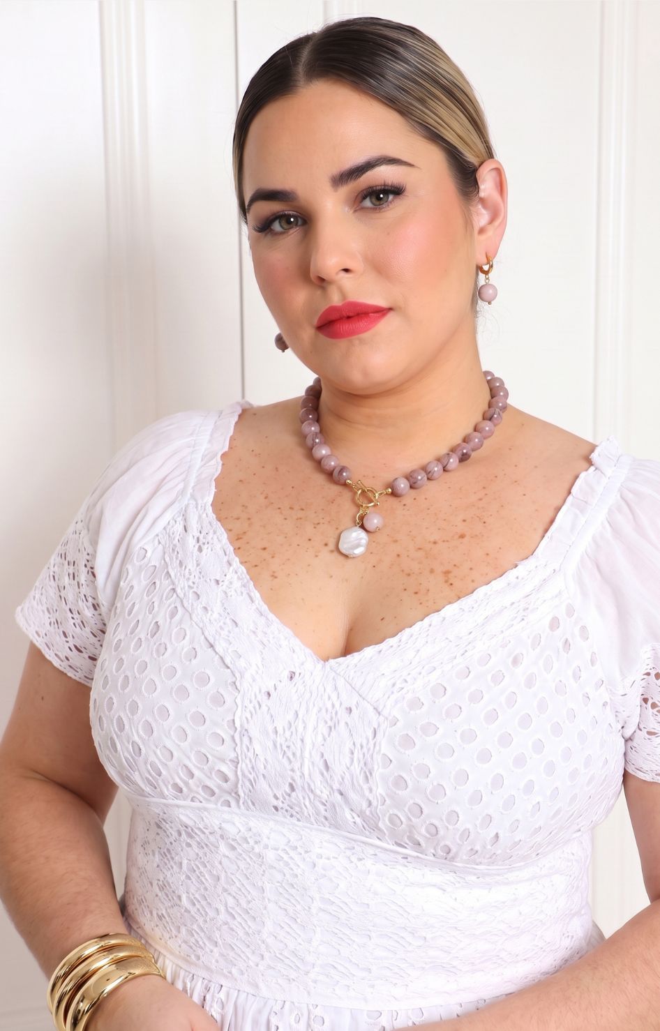 Set de collar y aretes con doble dije