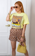 Blusa amarilla con estampado de perrito