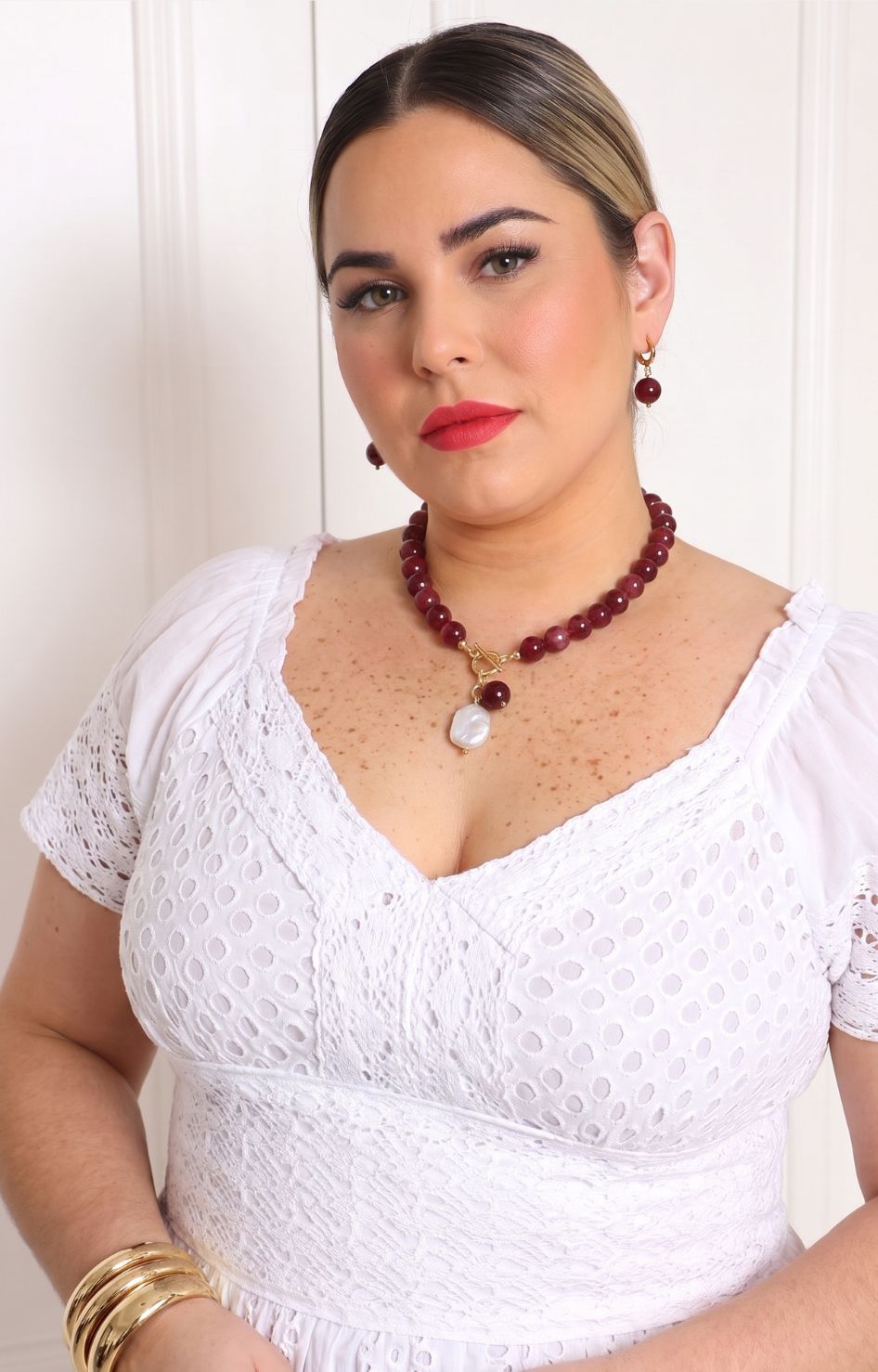 Set de collar y aretes con doble dije