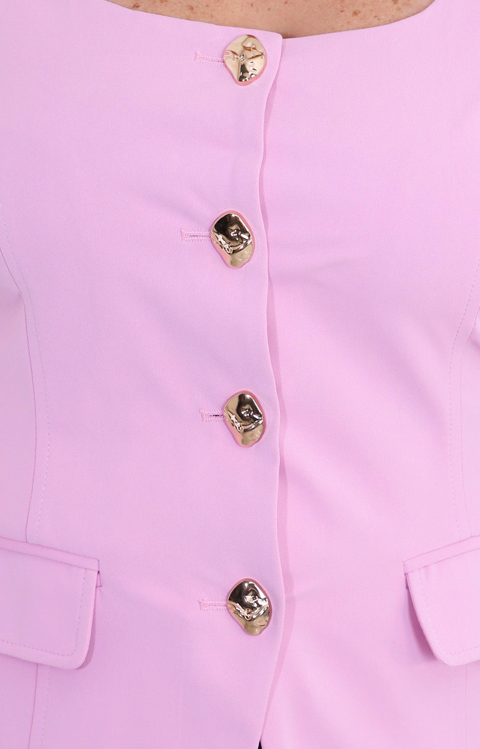 Blusa tipo chaleco con botones