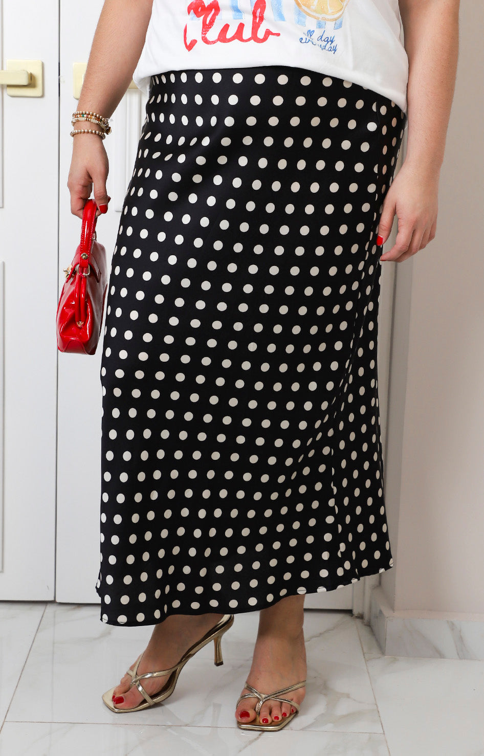 Falda satinada con polka dots