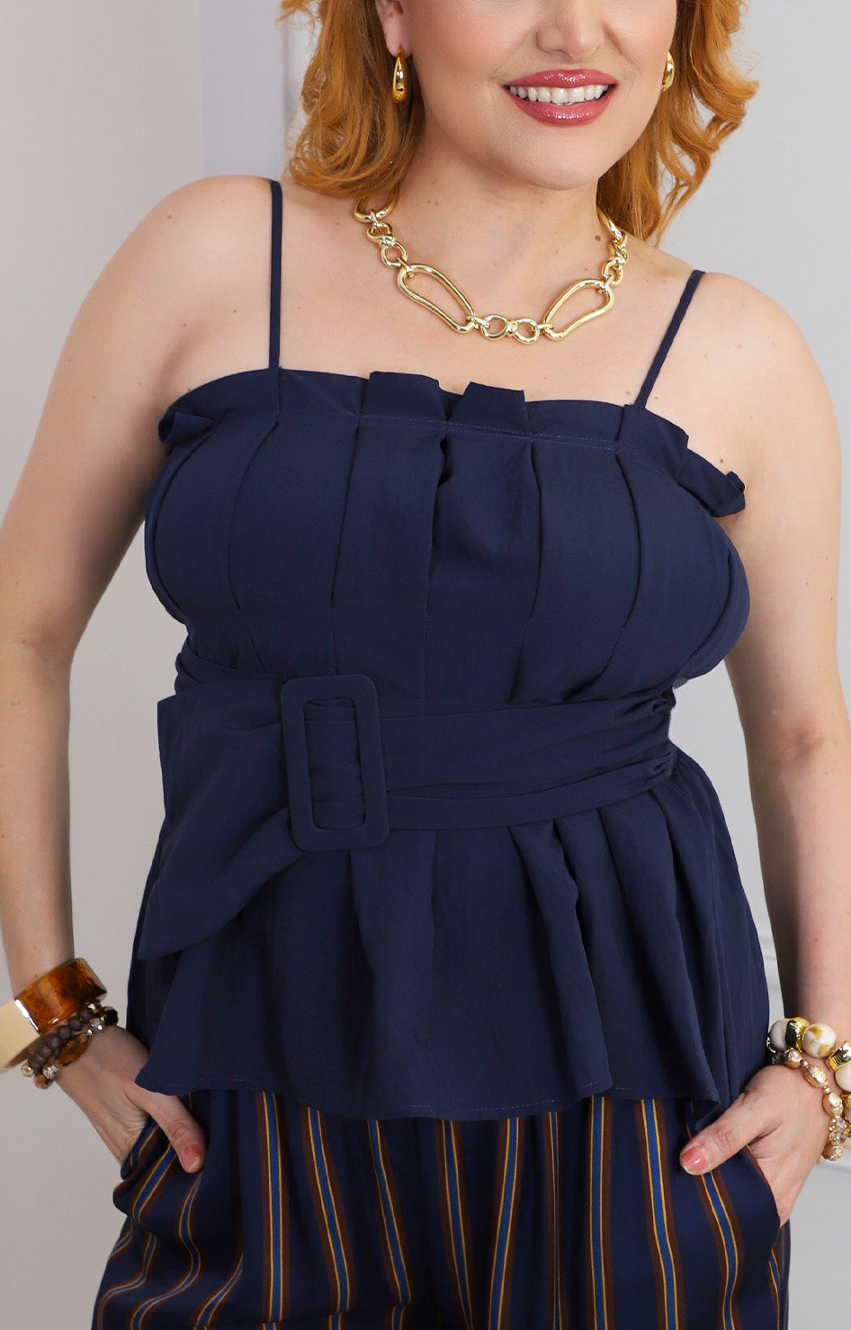 Blusa peplum con cinturón