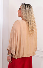 Blusa de seda con brillos