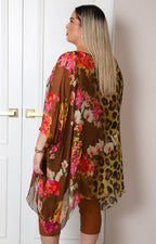 Blusa asimétrica estampado leopardo y floral