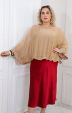 Blusa de seda con brillos