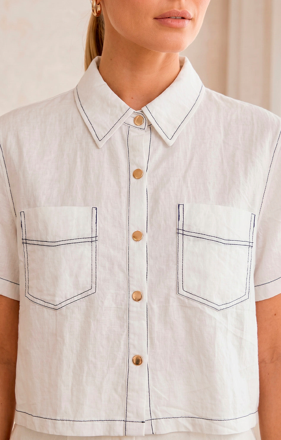 Blusa camisera con bolsillos