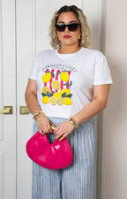 Blusa blanca con estampado de limones