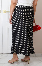Falda satinada con polka dots