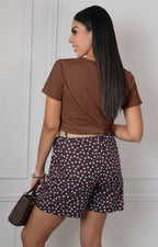 Blusa con estampado floral y aplicaciones