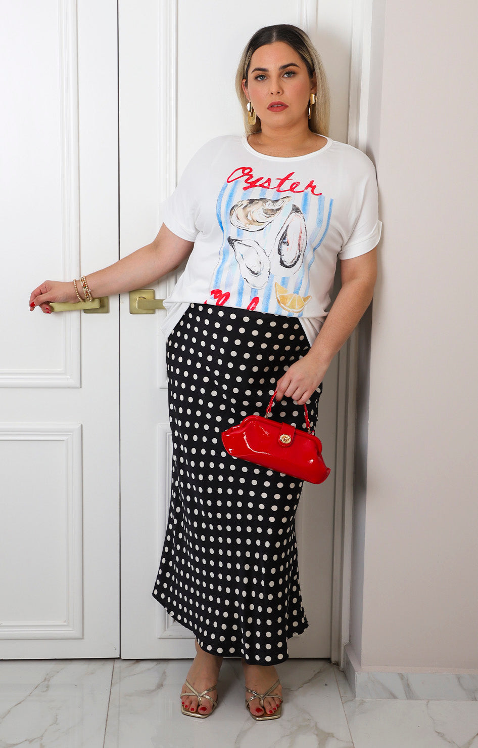 Falda satinada con polka dots