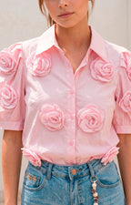 Blusa con flores 3D