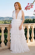 Vestido blanco con volantes y perlas