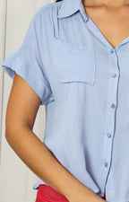 Blusa camisera con bolsillos