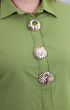Blusa lisa con maxi botones