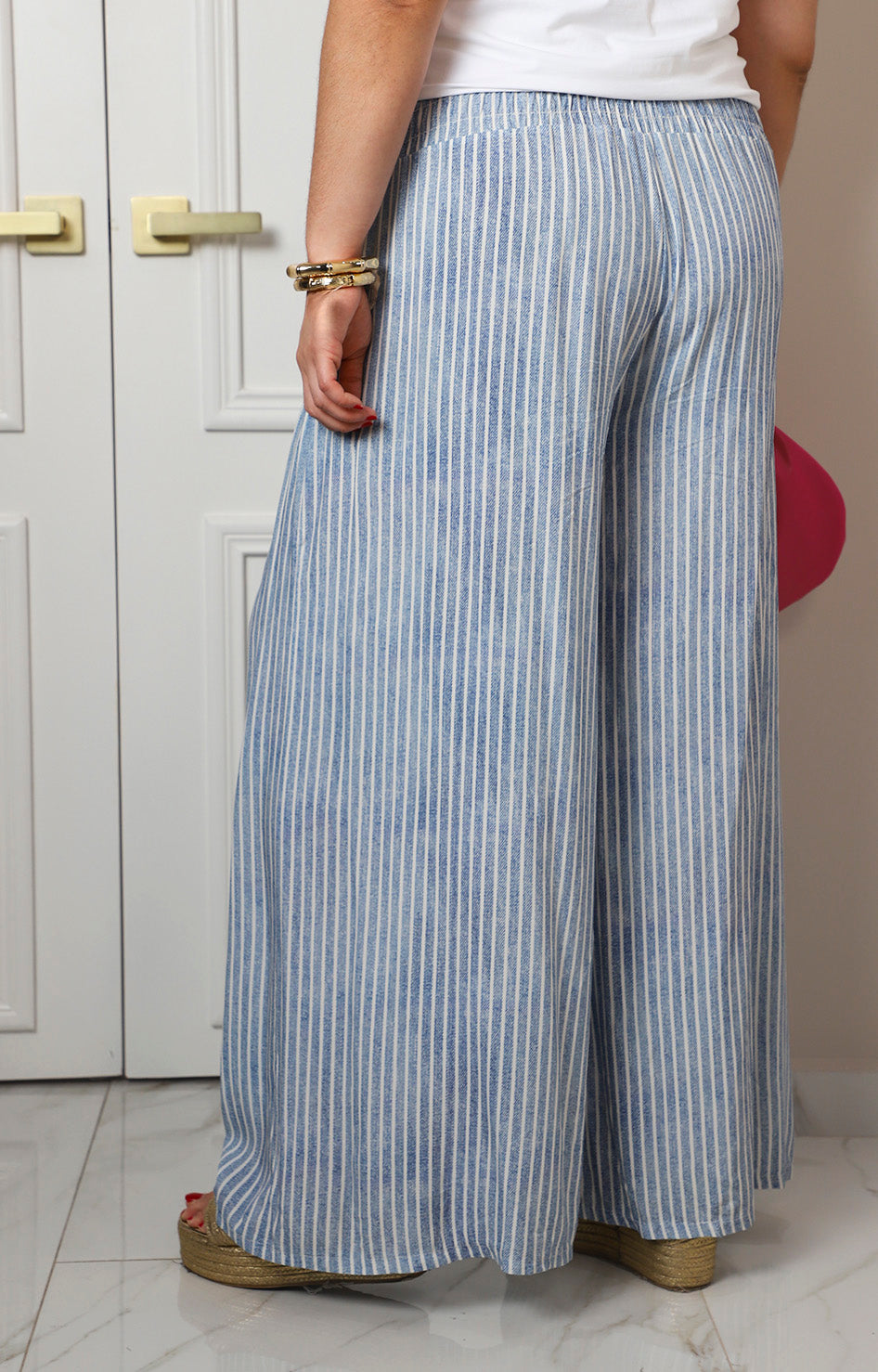 Pantalón a rayas azul de tiro alto