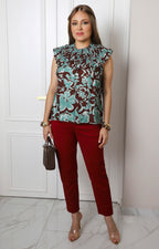 Blusa floral con cuello fruncido