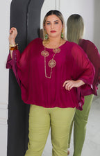 Blusa de seda con brillos