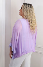 Blusa de seda con brillos