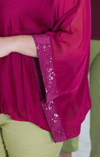 Blusa de seda con brillos