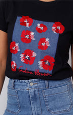Blusa con estampado floral y aplicaciones