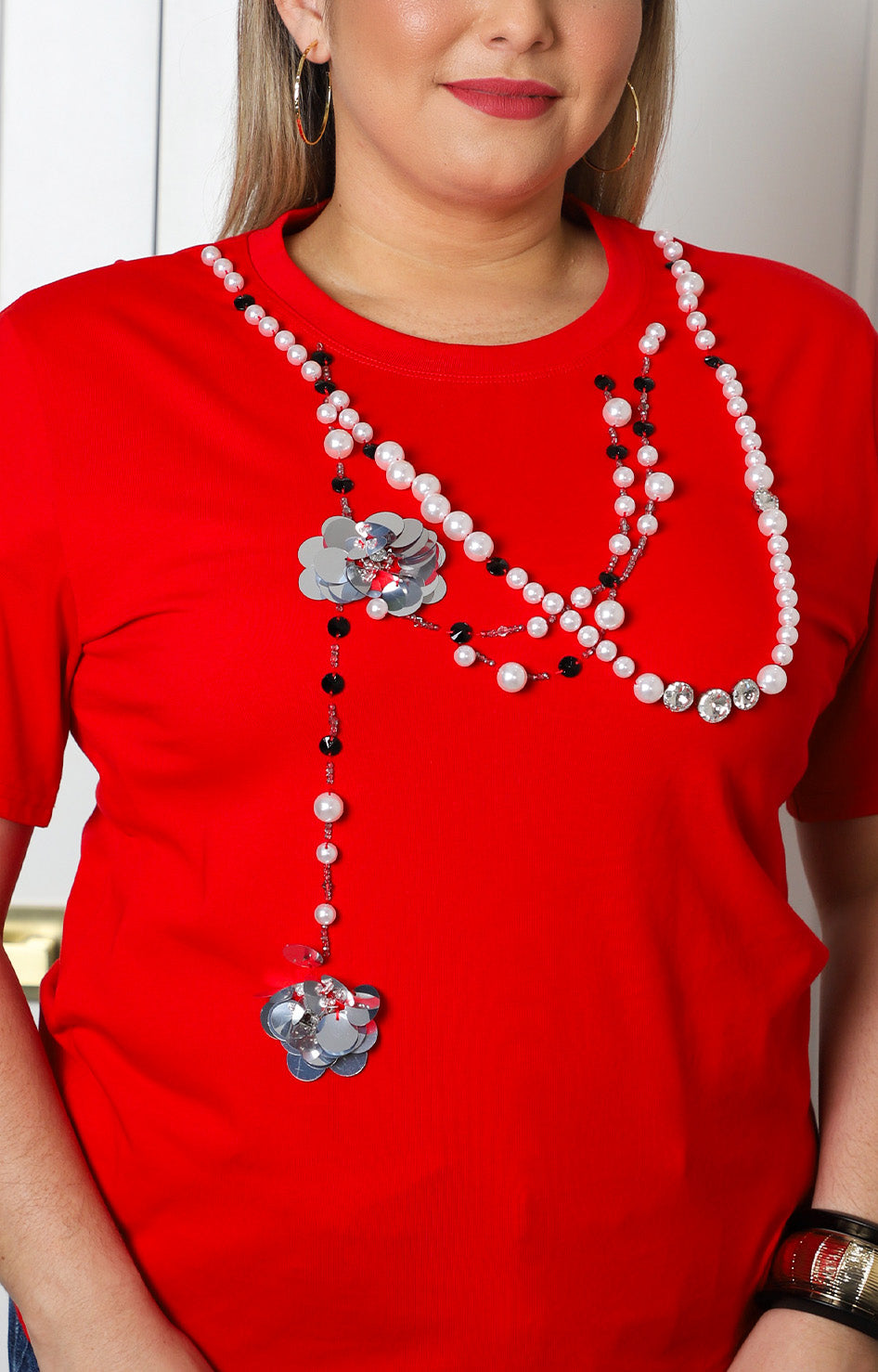 Blusa de algodón con aplicaciones
