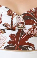 Conjunto beige con estampado tropical café