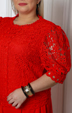 Blusa de guipur con mangas globo