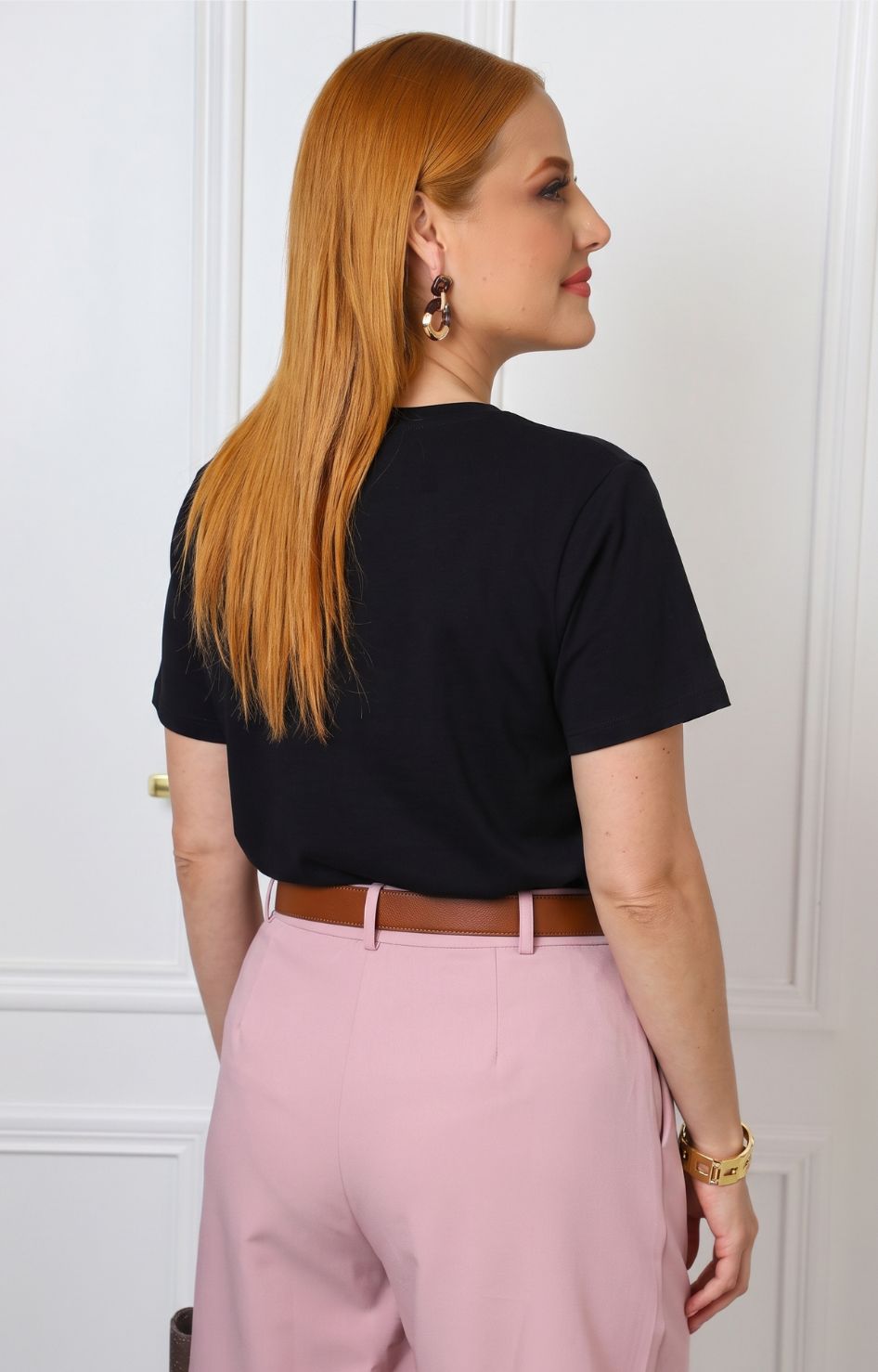 Blusa con estampado de cupido y aplicaciones