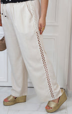Pantalón beige con bordado