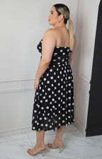 Vestido strapless negro con estampado polka dot