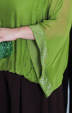 Blusa de seda con brillos