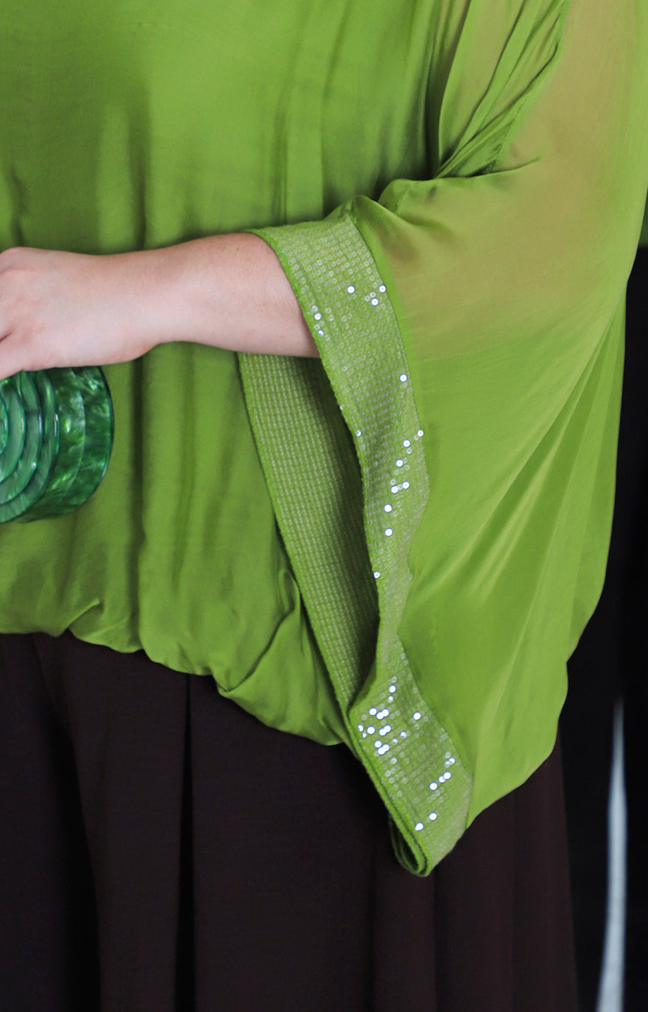 Blusa de seda con brillos