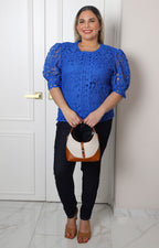 Blusa de guipur con mangas globo