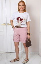 Blusa con estampado de cupido y aplicaciones