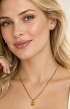 Set de collar y aretes con osito liso dorado
