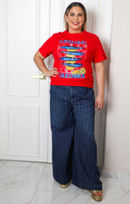 Blusa roja con aplicaciones brillantes