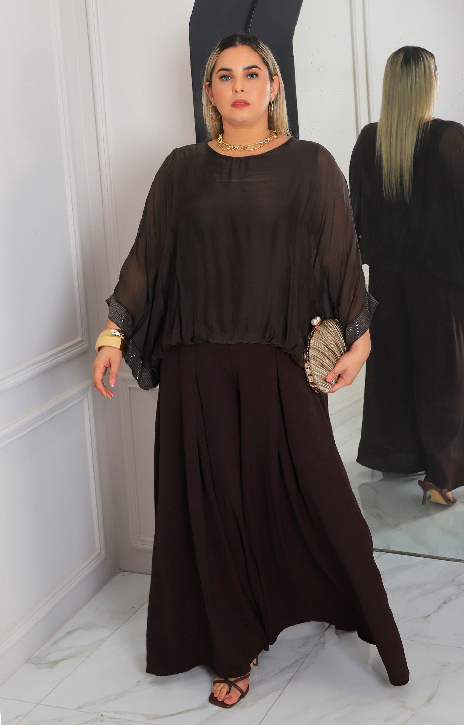 Blusa de seda con brillos
