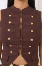 Blusa tejida con botones dorados