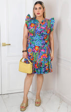 Vestido con estampado floral y olanes