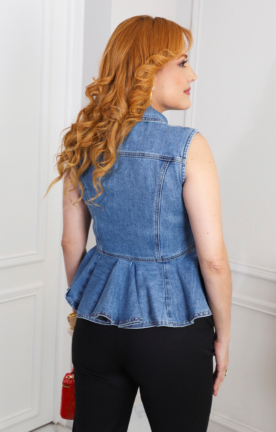 Blusa peplum de mezclilla
