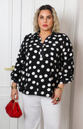 Blusa negra polka dots con escote en V