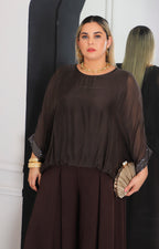 Blusa de seda con brillos
