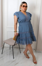 Vestido corto con encaje floral y mangas globo