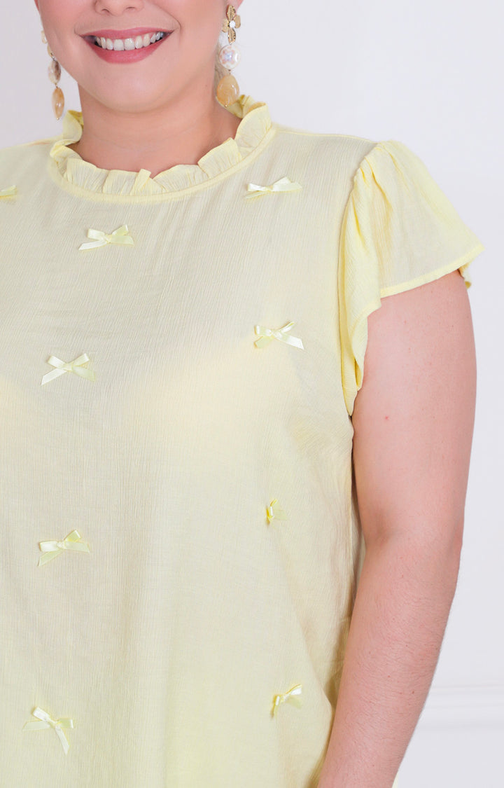 Blusa con moños