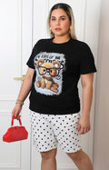 Blusa negra con estampado de osito y aplicaciones