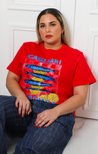 Blusa roja con aplicaciones brillantes