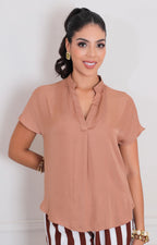Blusa lisa con mangas