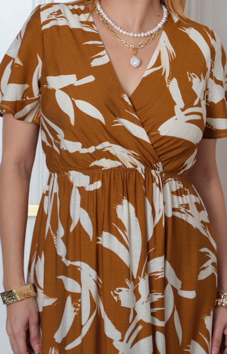 Vestido midi estampado con escote cruzado